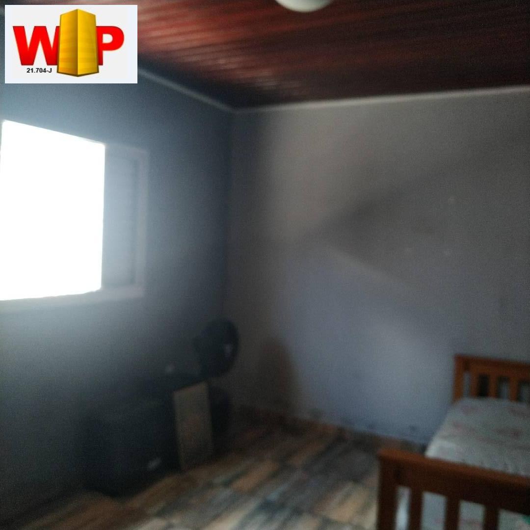 Casa à venda com 5 quartos, 147m² - Foto 11
